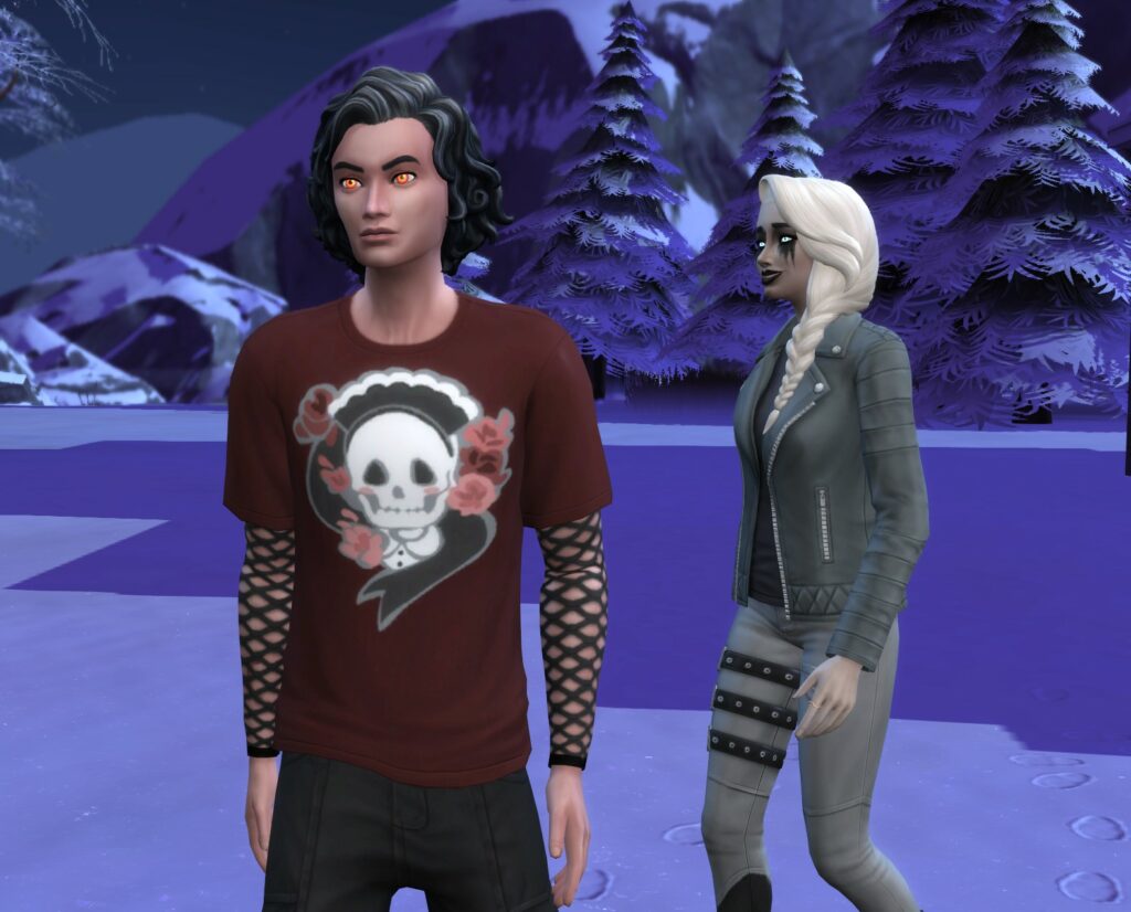 Two vampires, one female and one male, in Goth Galore Kit attire.